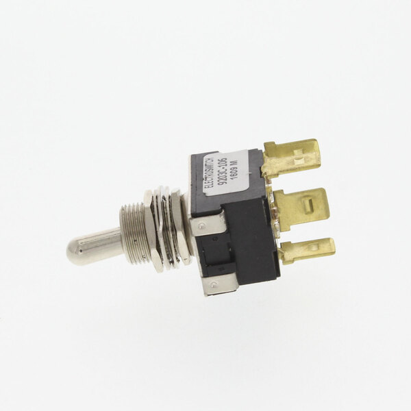 A close-up of a Cornelius toggle switch with two gold connectors.
