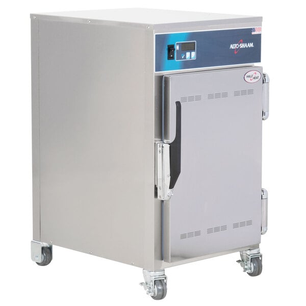 An Alto-Shaam stainless steel holding cabinet on wheels.