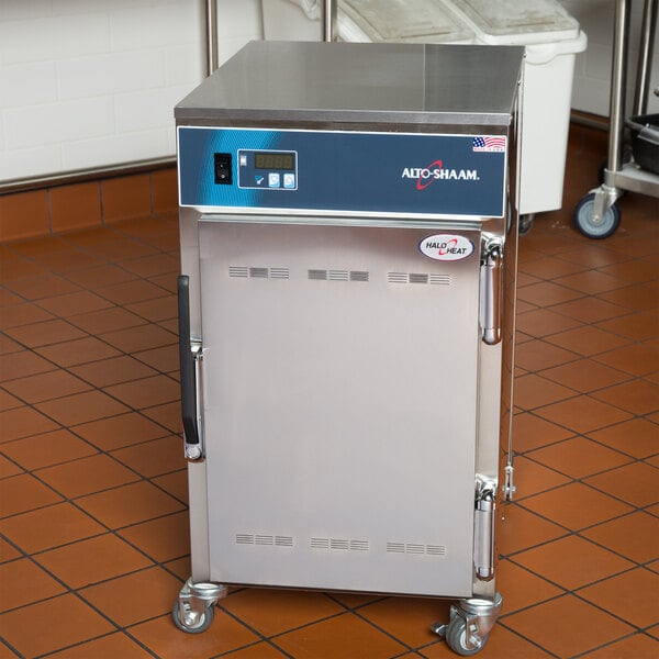 An Alto-Shaam 500-S mobile holding cabinet on wheels.