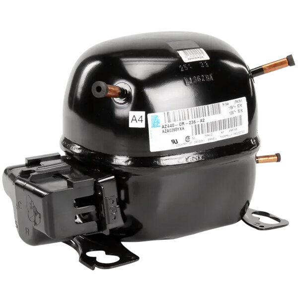 An APW Wyott black refrigeration compressor with a metal housing.