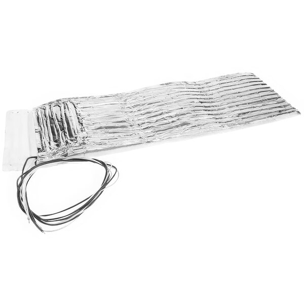 A silver foil heater with silver wires wrapped in plastic.