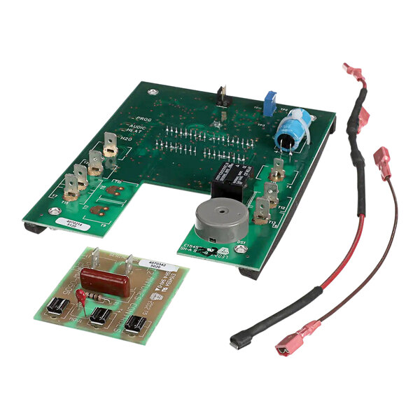 A close-up of a green circuit board with wires.