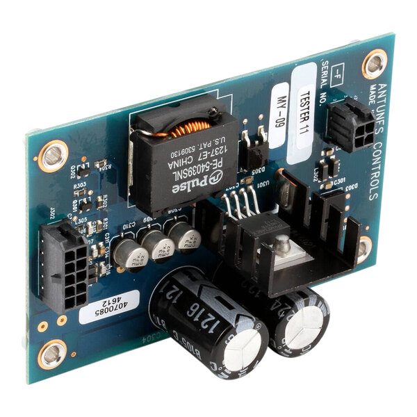 A close-up of an Antunes power supply board with two black and white electronic components.