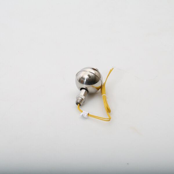 a round silver ball with yellow wire