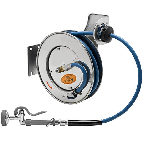 A T&S stainless steel hose reel with a hose attached.
