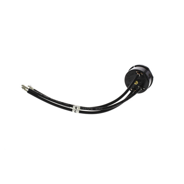 The white plug with black and white cables for an InSinkErator SS-75 Overload Protector.