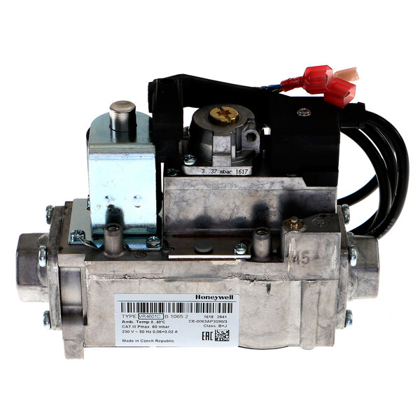 A Middleby Marshall gas valve with a wire attached.