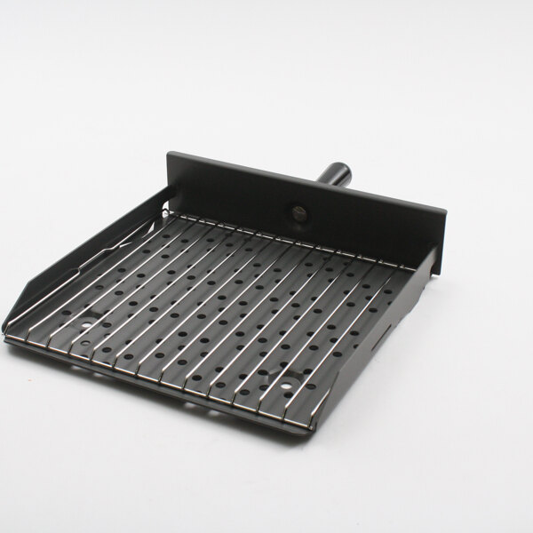 a black metal griddle with holes