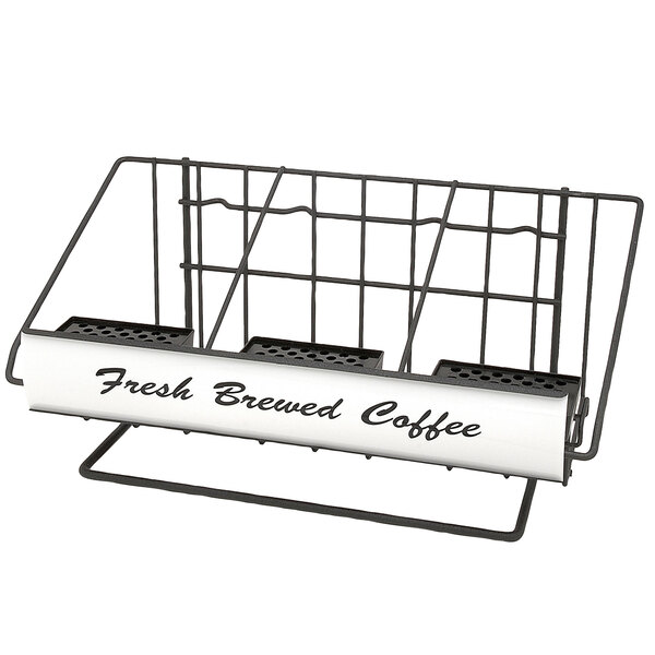 A black metal Grindmaster wide airpot rack on a counter with a white sign.
