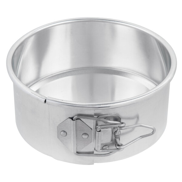 A Chicago Metallic aluminum springform cake pan with a clip.