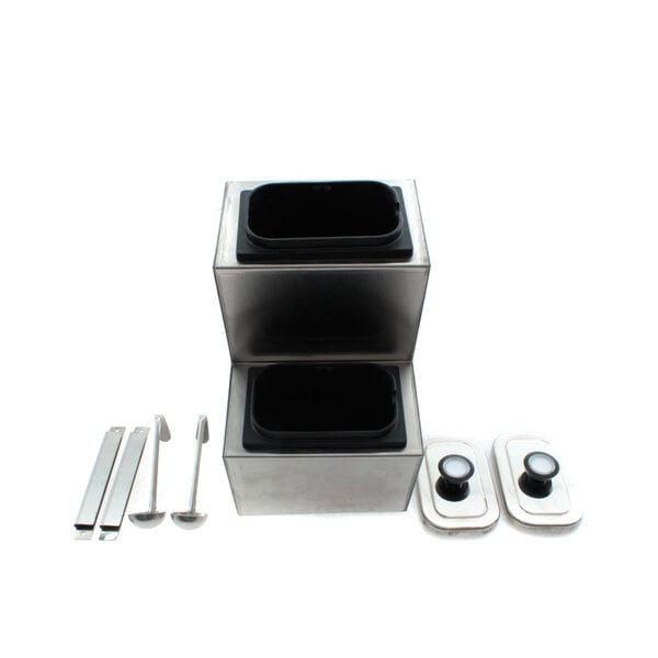 A stainless steel SaniServ syrup rail with two metal trays inside.