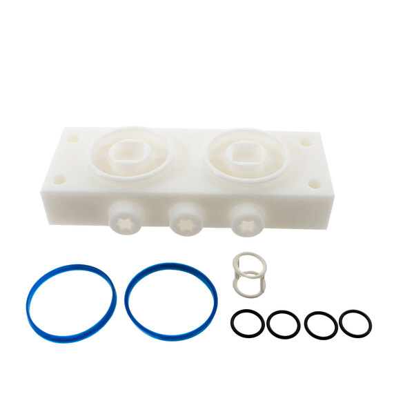 A white plastic front plate with rubber seals, blue and black rings, and holes.