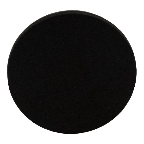 A round black non-skid pad.