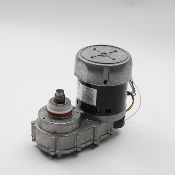 A Cornelius gear motor with a small metal housing and wires.