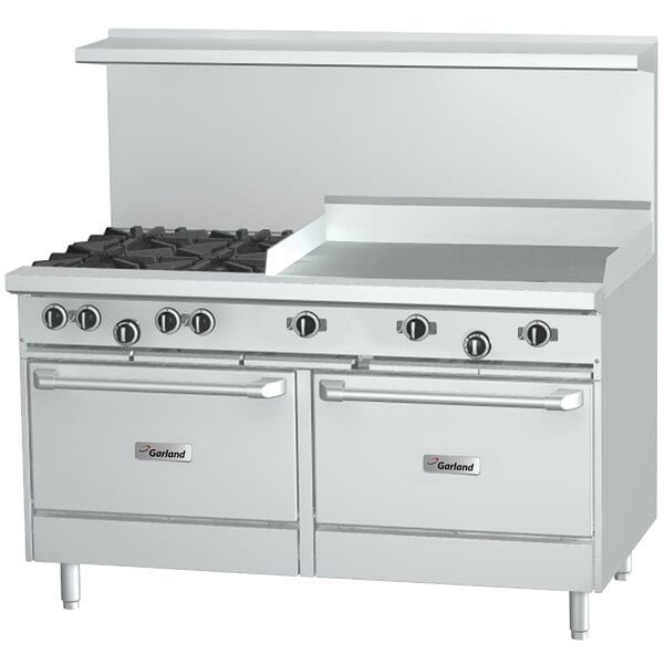 A stainless steel Garland commercial gas range with two ovens and a griddle over two burners.