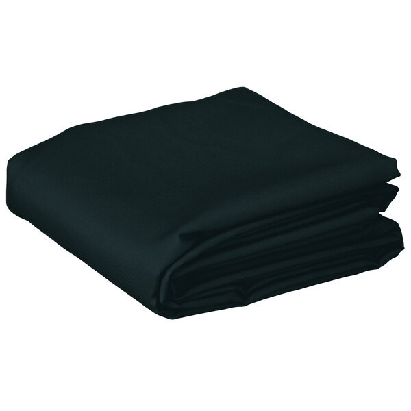 A stack of folded hunter green rectangular table covers.