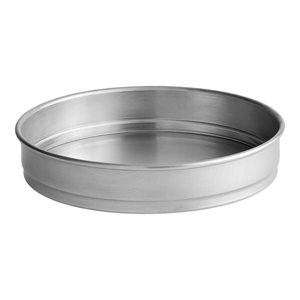 A close-up of a silver circular American Metalcraft cake pan.
