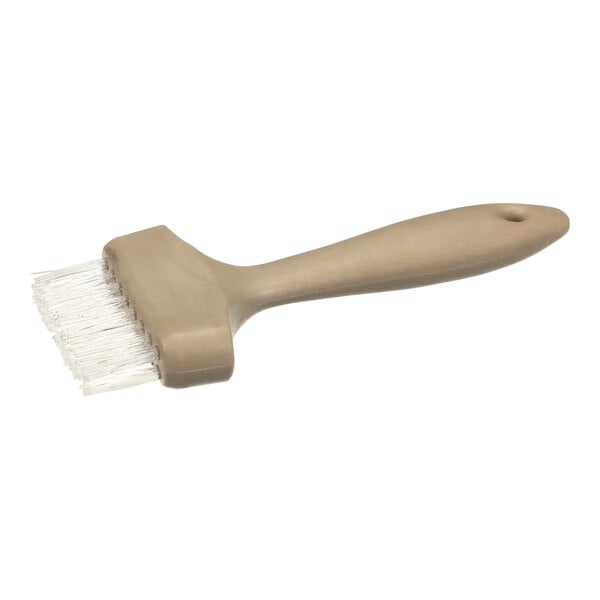 An Electrolux cleaning brush with a beige handle and white bristles.