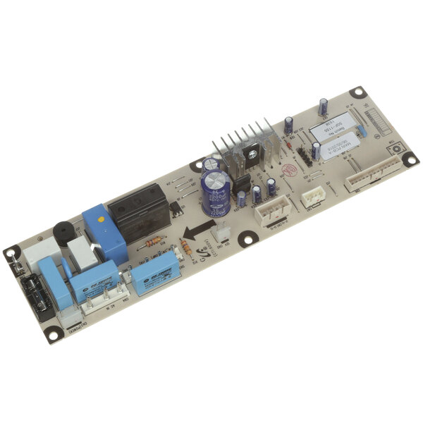 A close-up of a Beverage-Air control board with a blue rectangular object and a yellow circle on it.