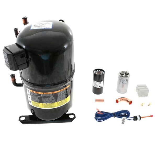 A black Manitowoc Ice compressor assembly with parts and wires.