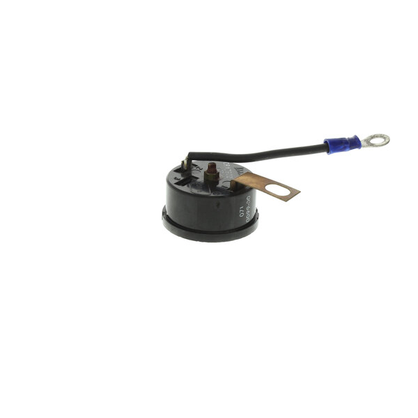 a black round device with a blue wire