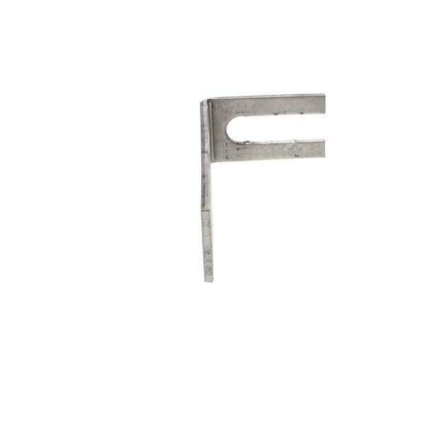 A metal piece with a small hole in it.
