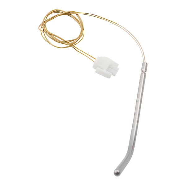 A Duke temp probe with a gold and white wire and gold connector.