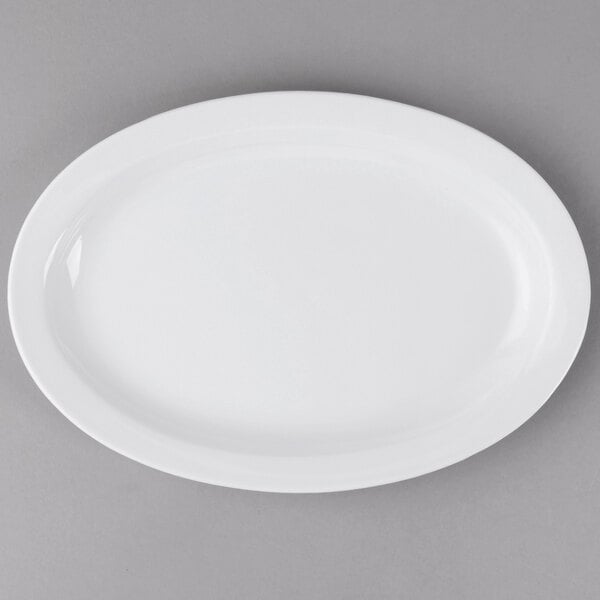 A white Thunder Group Nustone melamine oval platter with a narrow white rim.