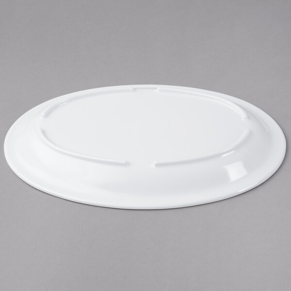 a white plate on a gray background