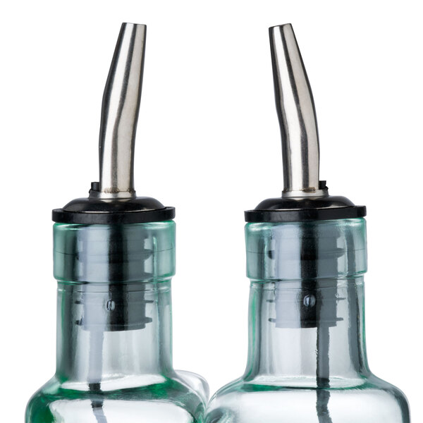 A close-up of a Tablecraft glass bottle with a chrome pourer.