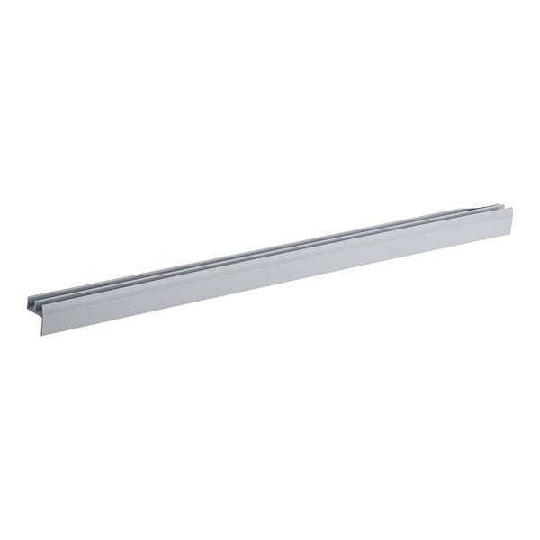 A True Refrigeration door sweep, a white rectangular metal strip.