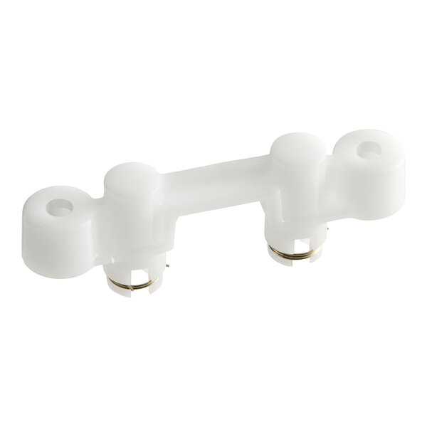 A white plastic Hamilton Beach Lock Block with two metal rings.