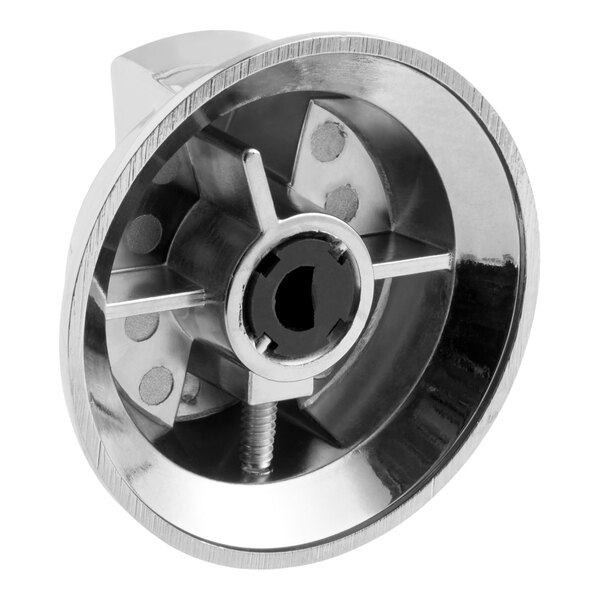A metallic, circular knob assembly with a central hole and radial supports, featuring a shiny, reflective surface.