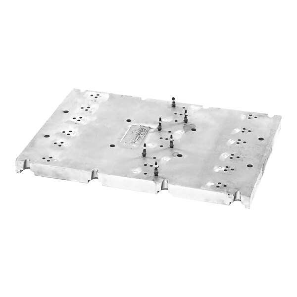 A Crown Steam metal plate with screws.