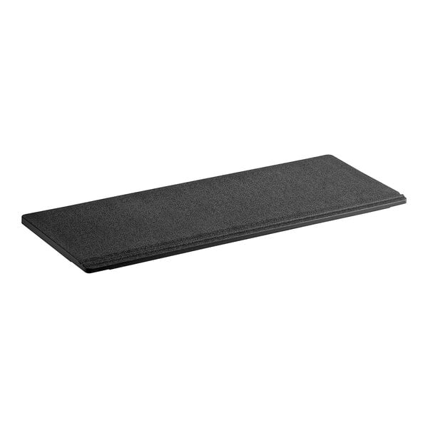 A black rectangular Ice-O-Matic door bin on a table.