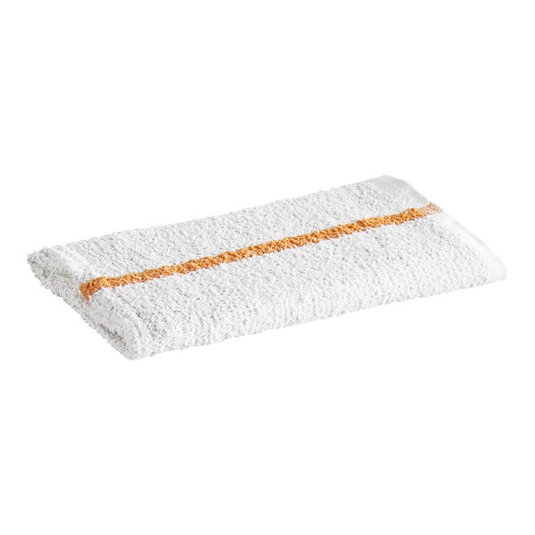 A white textured towel with a single gold stripe running lengthwise across the center.