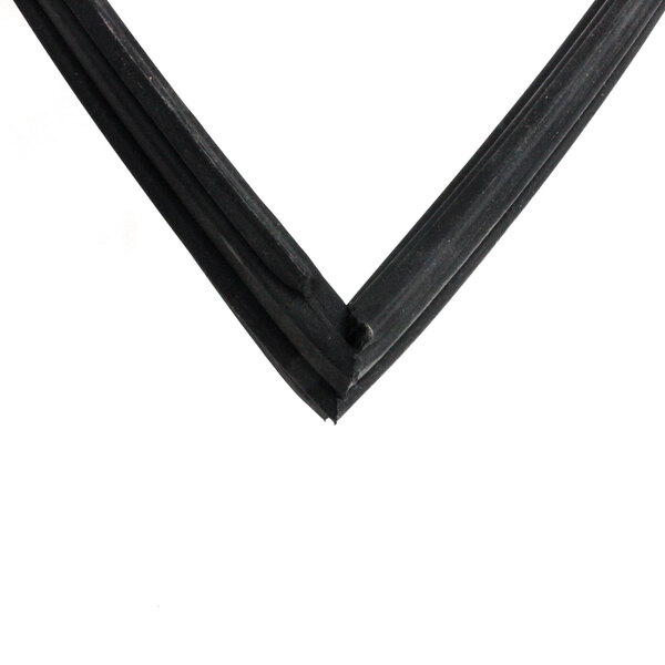 A close-up of a black rubber corner with a small triangle on it.