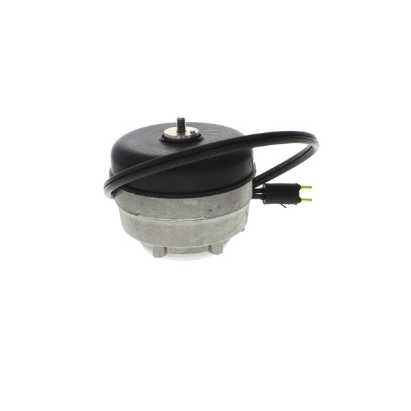 A close-up of a small round metal Structural Concepts fan motor with a black cord.