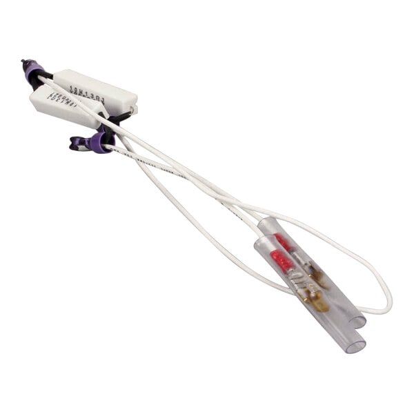 A close-up of a Frymaster resistor with a white and purple cable with two wires.