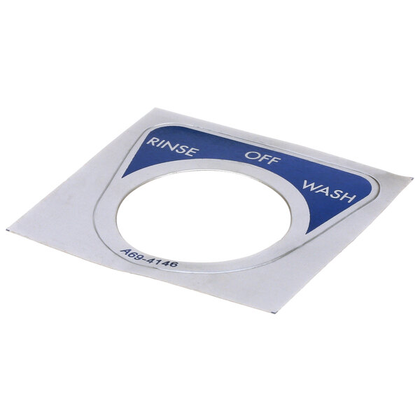 A white metal circular label that reads "Stero Dcl Rinse Off Wash"