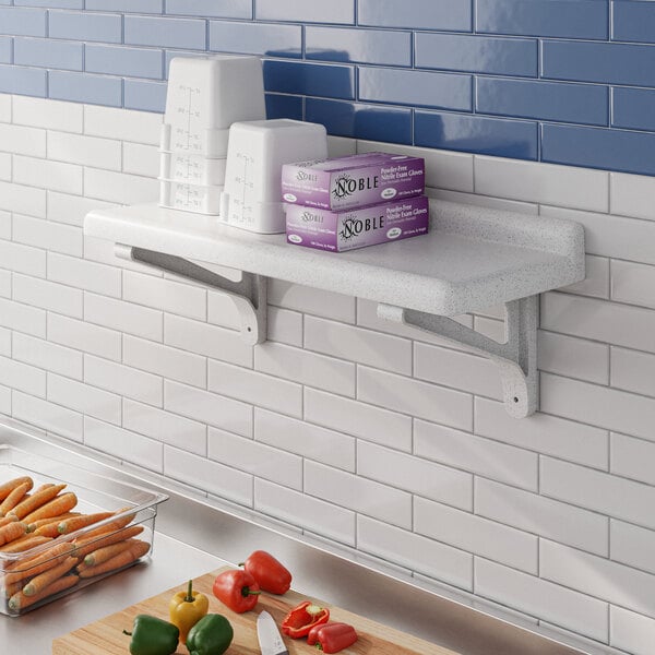 A white Cambro Camshelving wall shelf holding purple boxes with black text.