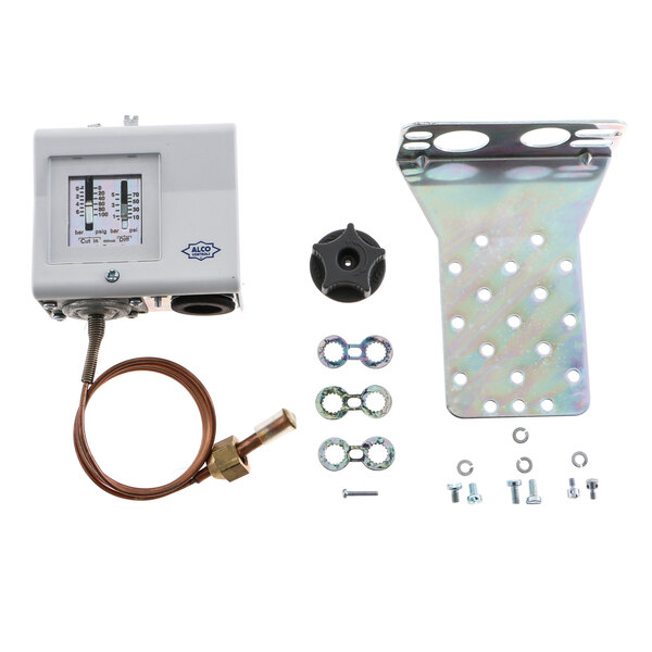 A white rectangular True Refrigeration low pressure control with wire and screws on a metal piece.