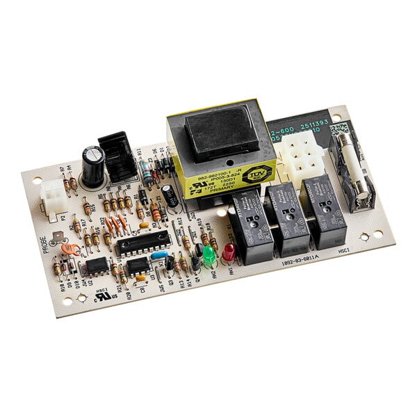 A close-up of a Manitowoc Ice control board with various electronic components.