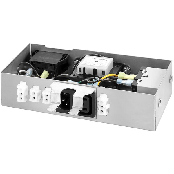 A Pitco pump control box for a fryer with wires and electrical outlets.