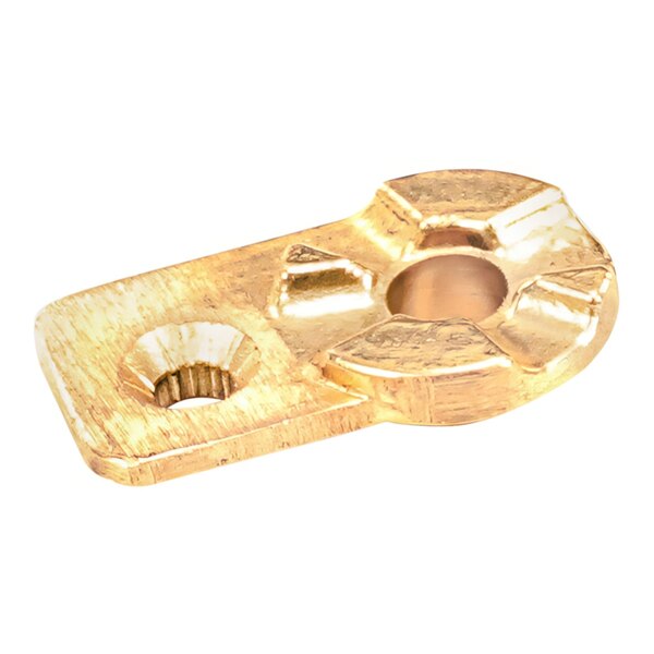 A gold metal hinge plate with holes.