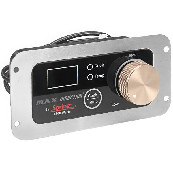 A metal and black control box with a gold knob and USB plug.