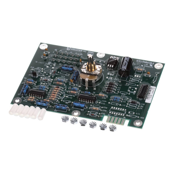 A Frymaster module kit with a green circuit board and small components.