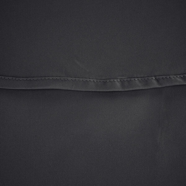 A close up of a black fabric Intedge round table cover.