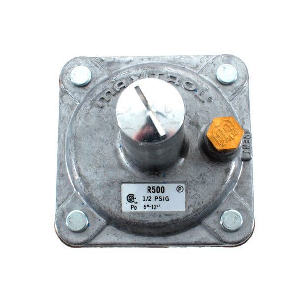 A close-up of a metal Tri-Star LP regulator with a yellow knob.