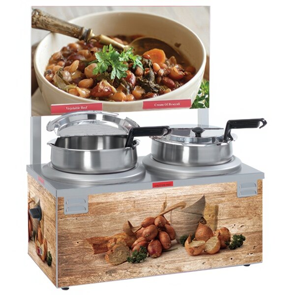 A Nemco countertop soup warmer with two bowls of soup on a wooden stand.